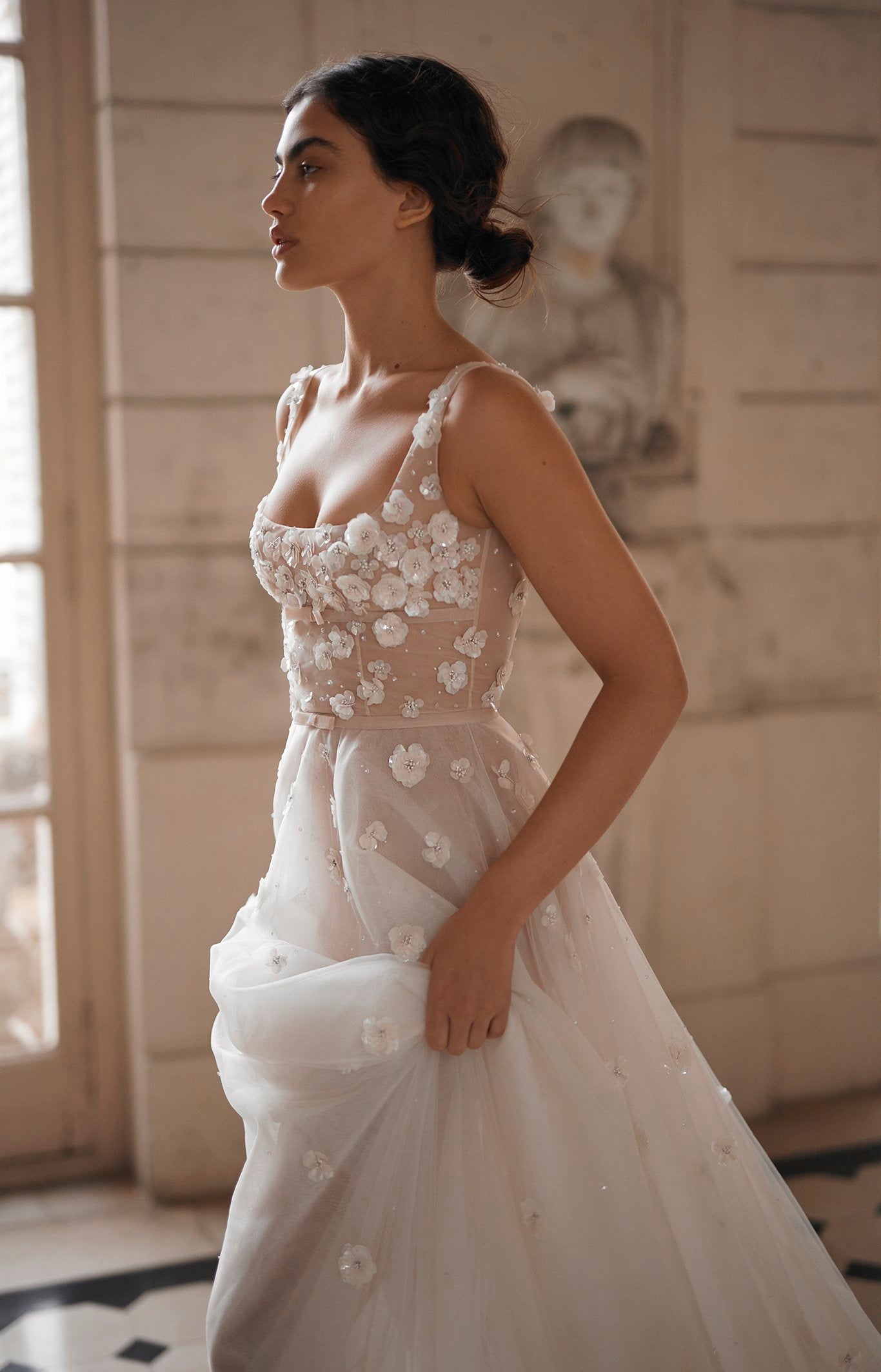 From the waist down, this dress will have a chiffon layer underneath which comes in a default blush colour but is also available in ivory if requested. 